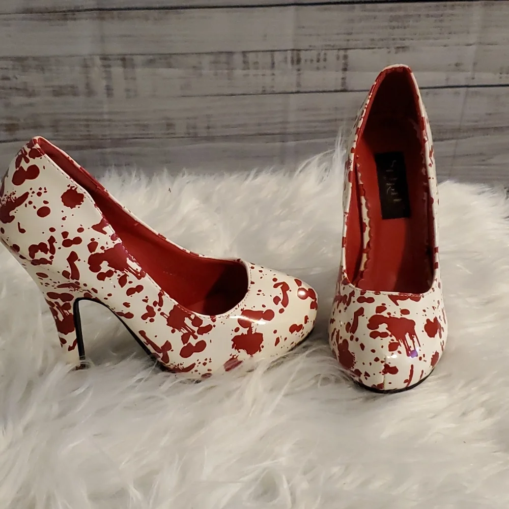 Spirit Halloween fake blood splatter pumps. Size 7. White/red - Picture 3 of 4
